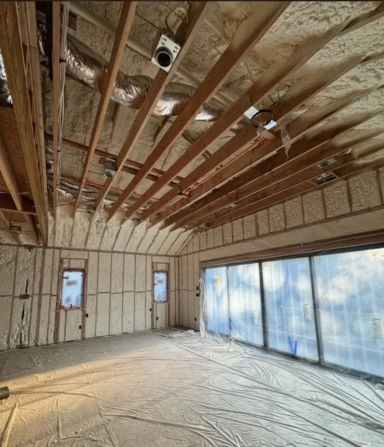 Interior walls and ceiling insulated with spray foam during new construction in Delanco